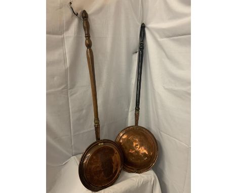 TWO VINTAGE COPPER BED WARMERS WITH WOODEN HANDLES 