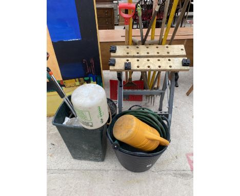AN ASSORTMENT OF TOOLS TO INCLUDE A WORK BENCH, GARDEN SPRAYER AND FORKS ETC 