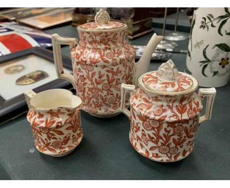 A SMALL VINTAGE FLORAL COFFEE POT TO INCLUDE A LIDDED SUGAR POT AND A SMALL CREAMER 