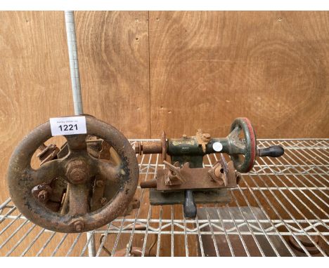 A VINTAGE LATHE HANDLE AND PULLEY SYSTEM 