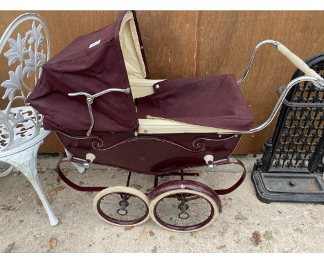 A VINTAGE SILVER CROSS PRAM 
