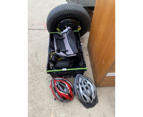 TWO CYCLING HELMETS, TWO PANNIERS, BAGS AND CYCLE TOOLS 