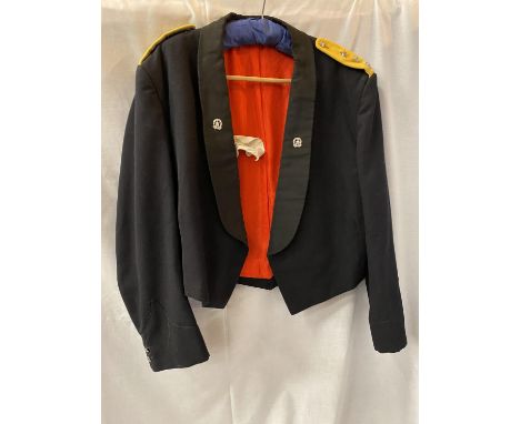 A SOUTH AFRICAN ARMY DINNER JACKET  WITH EX UNITAS VIRES EMBLEMS 