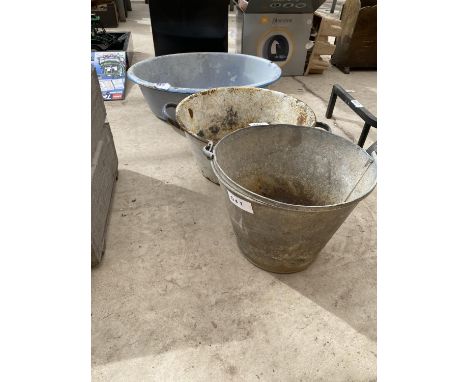 A GALVANISED BUCKET, AN ENAMEL PAN AND AN ENAMEL WASH BOWL 