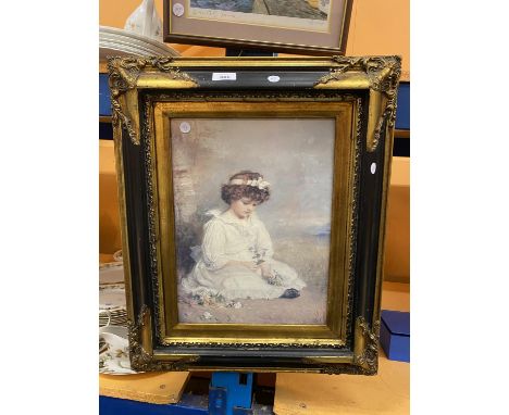 A VINTAGE FRAMED PICTURE OF A GIRL 