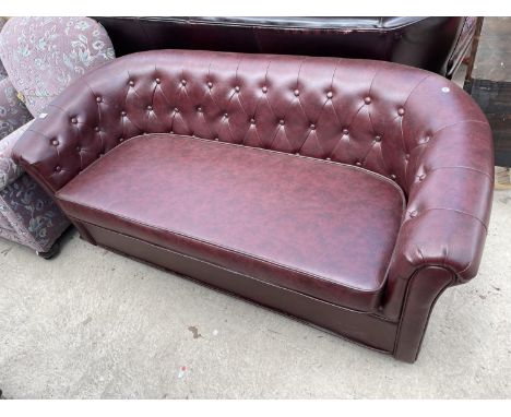 AN OXBLOOD BUTTON-BACK CHESTERFIELD STYLE SETTEE 