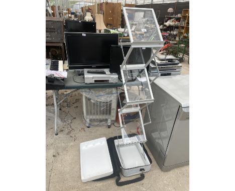 A DEFLECT-O ALLOY AND PERSPEX COLLAPSIBLE LEAFLET STAND 