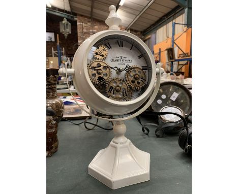 A CHAMPS ELYSEES DESIGN MANTEL CLOCK WITH VISABLE MOVEMENT H: 39CM 