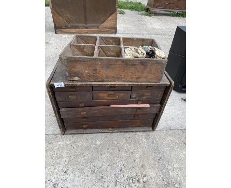 A VINTAGE ENGINEER'S CHEST WITH FOUR LONG AND SIX SMALL DRAWERS AND A VINTAGE TOOL BOX 