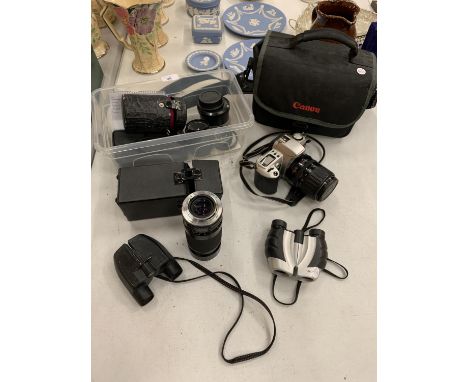 A CANON EOS 500N FILM CAMERA IN CANON CARRY BAG WITH AN EF 35-135MM ZOOM LENS, TWO TAMRON LENSES, A PENTAX 50MM LENS, A DURST