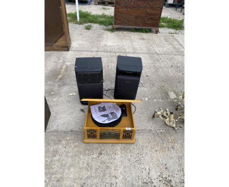 A VINTAGE STYLE TECHNOVATION RECORD DECK AND SPEAKERS 