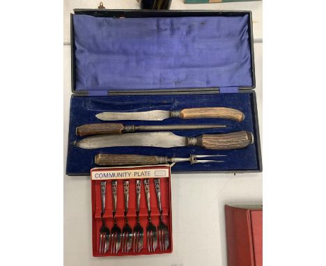 A VINTAGE BOXED MEAT CARVING SET AND SIX BOXED COMMUNITY PLATE CAKE FORKS 