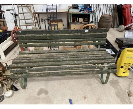 A VINTAGE SLATTED GARDEN BENCH WITH CAST METAL FRAME 