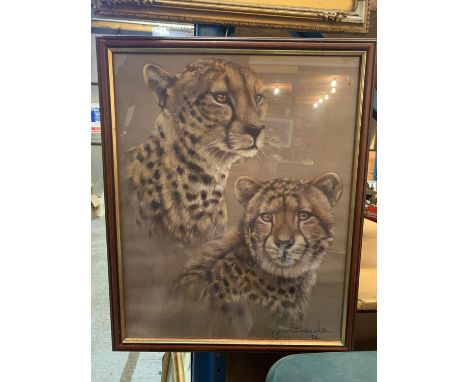 A FRAMED PRINT DEPICTING TWO LEOPARDS BY JOAN BENCHE 