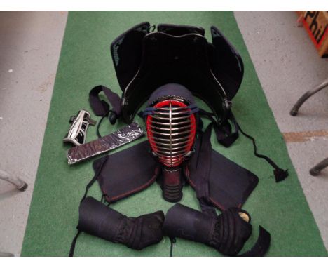 A COMPLETE KENDO MARTIAL ARTS COSTUME TO INCLUDE A BAMBOO SHINAI, ESCRIMA STICK AND CARRY BAGS 