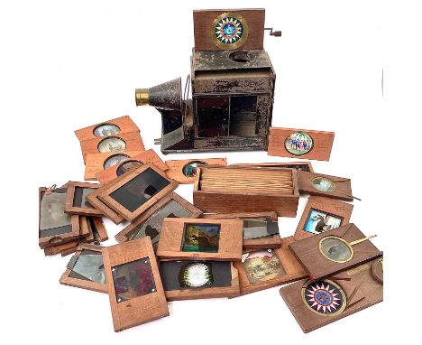 Tinplate Magic Lantern Viewer and Selection of Slides An incomplete tinplate viewer together with a good selection of slides 
