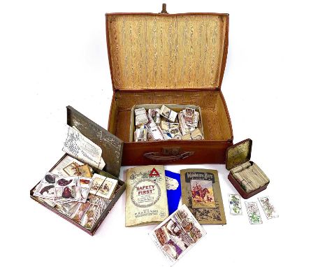 Cigarette Cards An attache case holding a large quantity of cigarette cards contained in tins, a box and albums. Condition mi