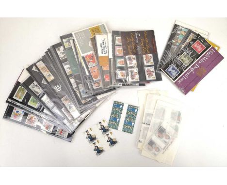 Great Britain Mint Decimal Stamps. A lot comprising a quantity of G.B. mint decimal stamps in presentation packs, loose in bl