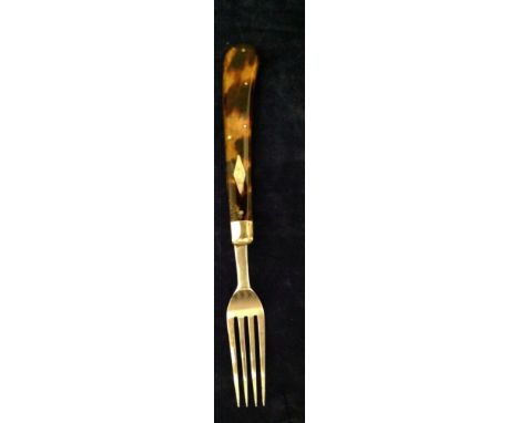 A 19TH CENTURY SOLID SILVER FORK Having a tortoiseshell handle with an inlaid silver lozenge, hallmarked Sheffield, 1860