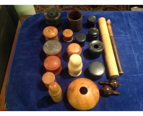 A COLLECTION OF TWENTY 19TH CENTURY AND LATER CARVED TREEN WOODEN BOXES Including lidded salts, two carved wooden wool winder
