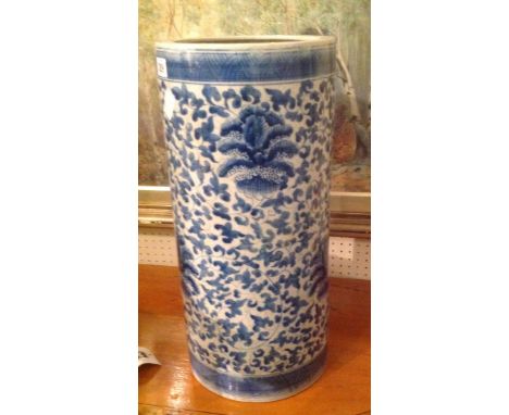 A CHINESE BLUE AND WHITE STICK STAND Having floral decoration and bearing a six character mark below. (h 52½cm) Condition: go