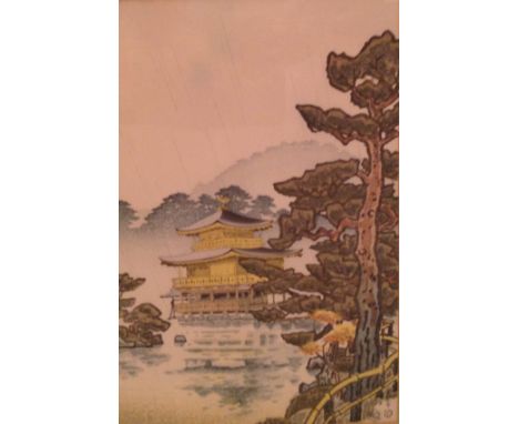 A 19TH CENTURY CHINESE WOODBLOCK PRINT ON PAPER Highlighted with gilt and signed to lower right. (27cm x 40cm)