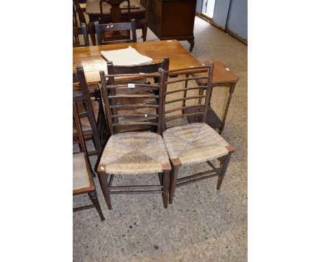 A pair of rush seat and ladder back side chairs