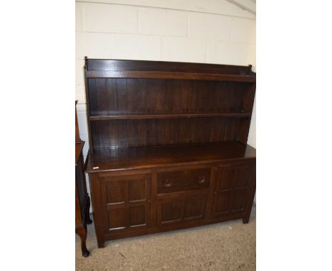 Early 20th Century oak dresser cabinet with two shelf back over a base with three doors and a single drawer