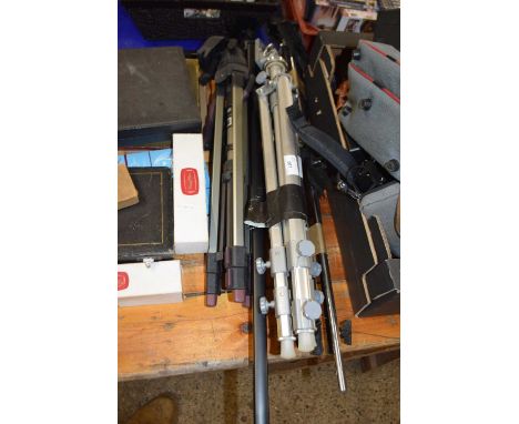 Group of four various camera tripods