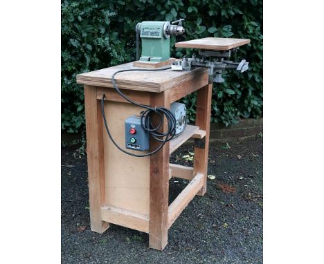 A vintage LUREM, France drill mounted on a work bench, bench 76cm wide.
