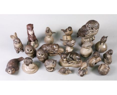 A collection of twenty Poole Pottery stoneware figures of animals, including an owl, 18cm high (20).