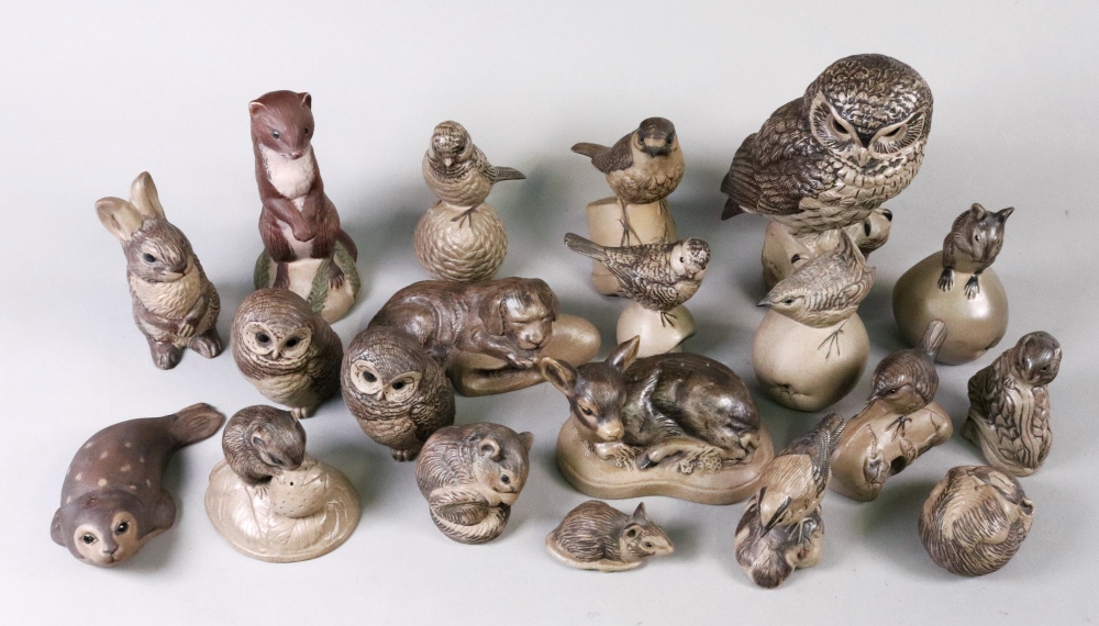 A collection of twenty Poole Pottery stoneware figures of animals ...