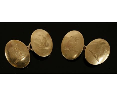 A pair of 18ct gold chain-link cufflinks,of oval, lightly bombé form.  Figure of eight connections, each plate hand engraved 