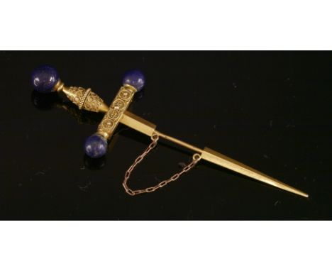 A Victorian gold Etruscan Revival lapis lazuli sword and scabbard pin,the grip and cross guard with applied twisted wire and 