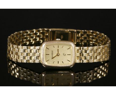 A ladies' 9ct gold Jean Pierre quartz bracelet watch,with a rectangular cushion-shaped champagne dial, with raised gilt baton