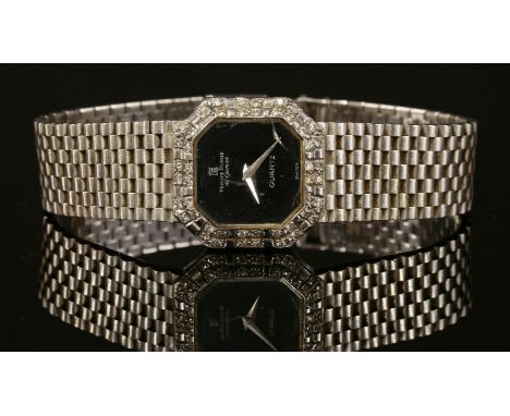 A ladies' 18ct white gold diamond set Montre Royale quartz bracelet watch,a square cut cornered case with black lacquer dial 