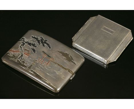 A Japanese silver cigarette case,with incised decoration, depicting a river scene with Mount Fuji, decorated with three-colou