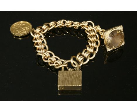 A 9ct gold curb link charm bracelet,with pairs of looped joining links and a 9ct gold large padlock clasp with bark textured 