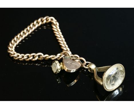 An Edwardian 9ct gold curb chain bracelet,with a large padlock clasp, hand engraved to the reverse 'M.B.  A large Georgian st