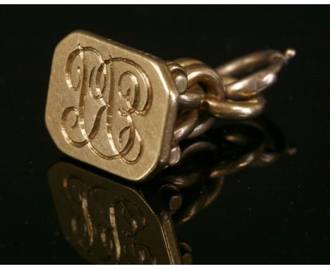 An 18ct gold George II seal,with a rectangular cut corner matrix intaglio engraved with script initials.  Pairs of crossover 