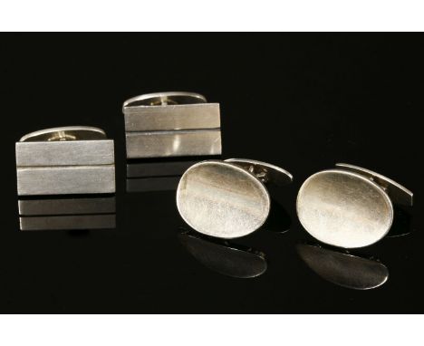 A pair of sterling silver oval cufflinks,by Bjerring Brothers of Copenhagen, 1964-1971, with concave oval heads and swivel fi