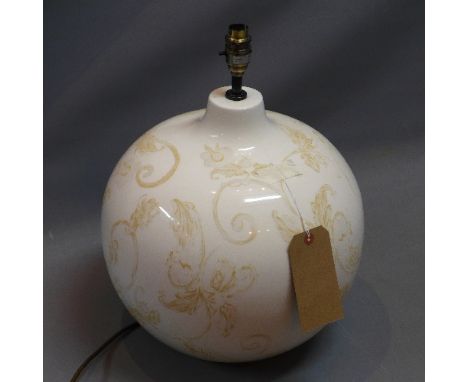 A Gabrielle porcelain table lamp, of ovoid form decorated with flowers, H. 43cm, together with two 1980s American table lamps