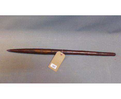 An Aboriginal tribal throwing stick having carved decoration, L:72cm