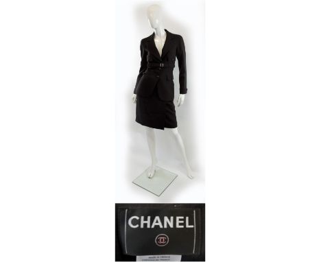 CHANEL SKIRT AND JACKET SUIT, fitted jacket with four front pocket details, two button fastening, button decorated with silve