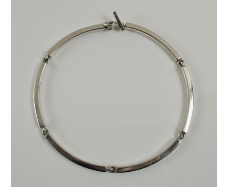 HANS HANSEN STERLING SILVER NECKLACE, of articulated design, comprising six rectangular shaped curved bar links, with single 