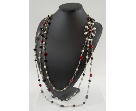 CHANEL THREE STRAND NECKLACE, glass beads, faux pearls, set with a deep fushia and aqua enamel Maltese cross, marked Chanel 1