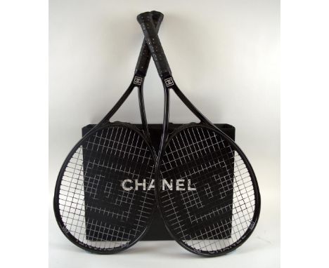 PAIR OF CHANEL TENNIS RACKETS, rare items, iconic double C logo, branded logo detail on strings, light weight, black and whit