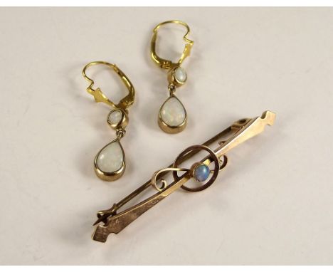 OPAL PIN ETC. A 9ct. gold opal set bar brooch &amp; a pair of opal drop earrings.