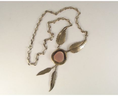 MEXICAN SILVER. A silver &amp; mother of pearl necklace, probably of Mexican design. Stamped SJ. Length of pendant drop 7cm.
