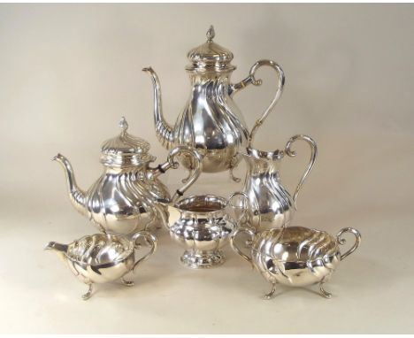 DANISH SILVER.An early 20th century Danish four piece tea & coffee service, comprising coffee pot, teapot, cream jug & sugar 